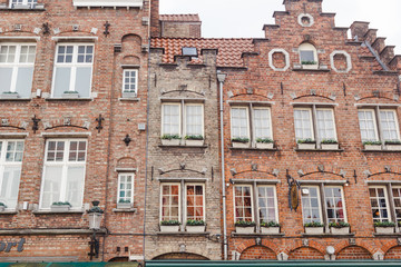 Architecture of narrow bicked street of Brugge town in Begium