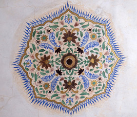 Beatiful ornament on wall of palace in Amber Fort in Jaipur, Rajasthan, India