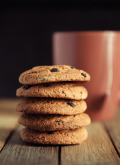 Stack of cookies and cup of tea