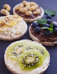 Healthy sandwiches with berries, fruits, seeds and nuts