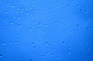 Background of water drops on a window glass
