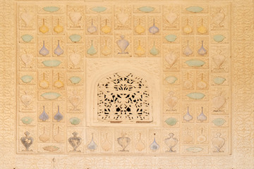 Beatiful ornament on wall of palace in Amber Fort in Jaipur, Rajasthan, India