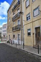 Fototapeta na wymiar Street in old town of Lisbon, Portugal