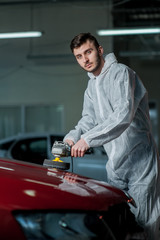 A series of detailed cars: Polishing a car