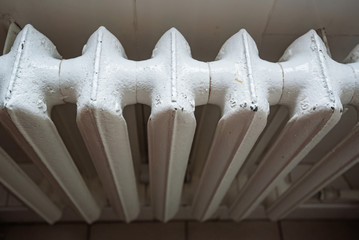 Cast iron household radiator close up
