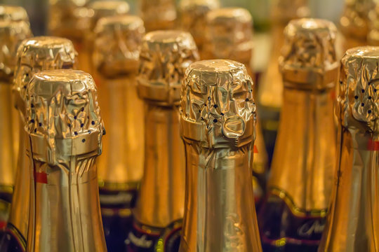 Close up champagne bottles in supermarket