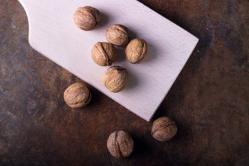 Walnuts close-up, walnuts on a Rusty background