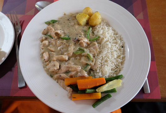 Chicken Stroganoff With White Rice And Vegetables