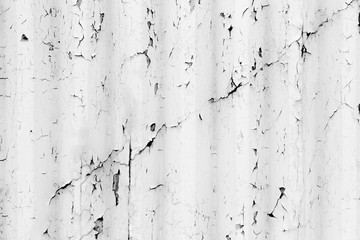 a background of peeling paint and rusty old metal