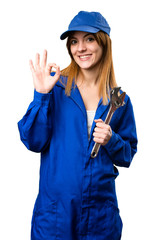 Delivery woman making OK sign