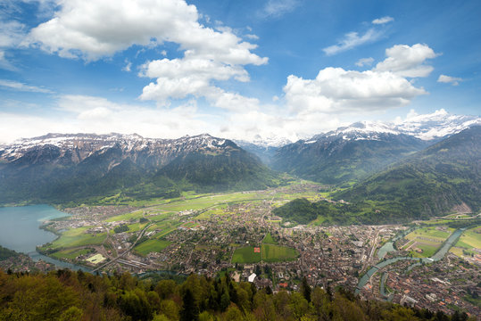 Aerial view of city district and Interlaken from viewpoint at Harder Kulm in Interlaken, Bern, Switzerland..