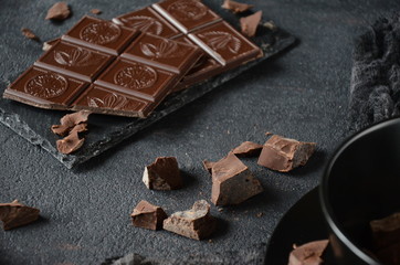 Dark photo. Dakr chocolate on the black table