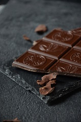 Dark photo. Dakr chocolate on the black table