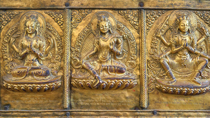 Golden carvings of Hindu Gods at Seto Machhendranath Temple in Kathmandu