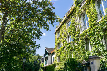PARIS, FRANCE - August 7, 2016 : beautiful Street view of  Montmartre in Paris, many artists had studios or worked in or around Montmartre. August 7, 2016, Paris, France.