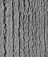 background. texture Board with vertical rough stripes, black and white.