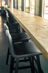 Empty bar and gray soft chairs