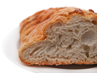 sliced loaf of white french country bread