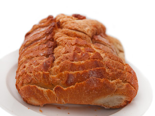 sliced loaf of white french country bread