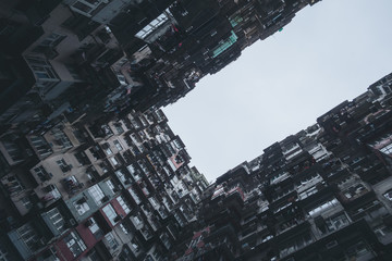 Low angle view image of a crowded residential building in community in Quarry Bay, Hong Kong