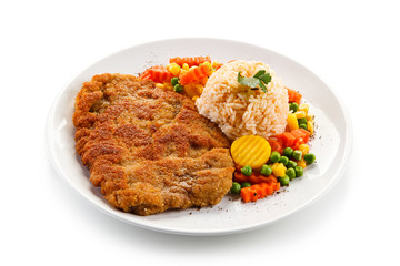 Fried pork chop with rice and vegetables