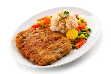 Fried pork chop with rice and vegetables
