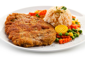 Fried pork chop with rice and vegetables