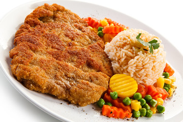 Fried pork chop with rice and vegetables