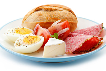 Breakfast - boiled eggs. ham and cheese sandwich