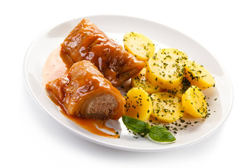 Wrapped minced meat with tomato sauce - polish dish gołąbki