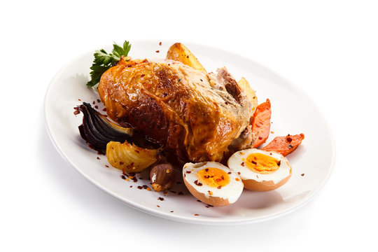 Roast chicken meat with potatoes and boiled egg