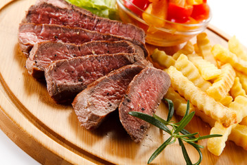 Grilled steaks with french fries