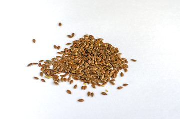 close up of flax seeds isolated on white background