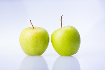 delicious juicy fresh green Apple on white background