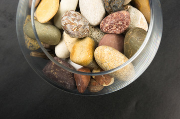 decorative pebbles in glass containers