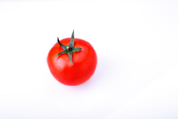 red tomato on white background