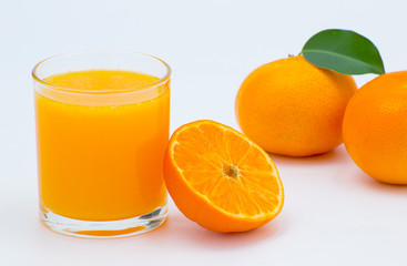 orange juice and slice isolated on white
