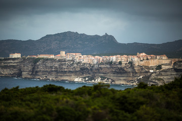 Fototapeta na wymiar Sunset over the Old Town of Bonifacio, the limestone cliff, South Coast of Corsica Island, France