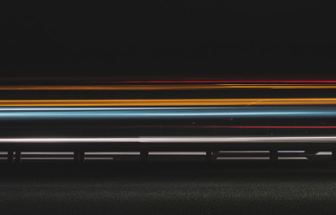 Super fast car lights in minimal style. Motion colorful urban background texture. Modern cityscape road traffic. Travel concept. Science hyperspeed  teleport movement. Time machine.