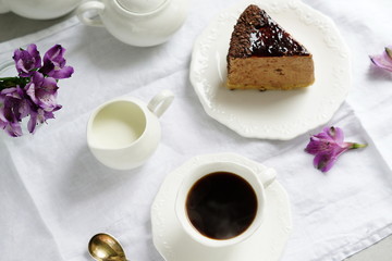 Coffee with milk and cake on a white background.top view.Holiday. Mother's day.