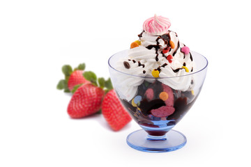 Strawberry ice cream with chocolate sauce and whipped cream 