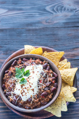 Bowl of chili con carne with tortilla chips