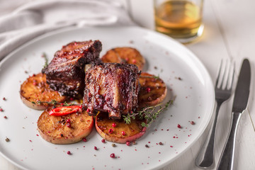 Hot Meat Dishes. Pork ribs grilled with peppers and apples