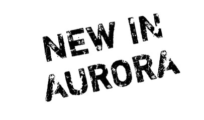 New In Aurora rubber stamp. Grunge design with dust scratches. Effects can be easily removed for a clean, crisp look. Color is easily changed.