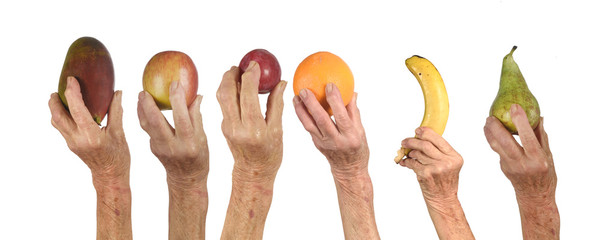 hands of senior woman with fruits
