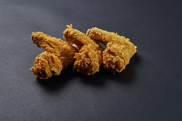 crispy kentucky fried chicken in beauty black background