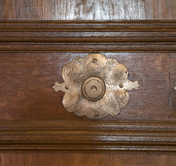Detail of an ancient wooden door carved.