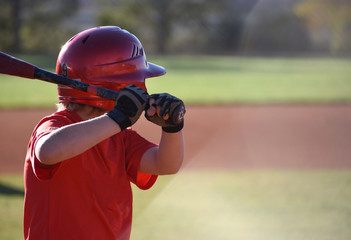 Young baseball player at bat