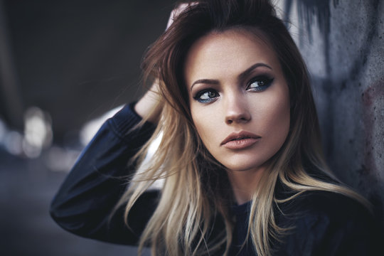 Beautiful young blonde with long hair posing