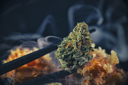 Macro detail of cannabis bud "black tuna" marijuana strain with sushi chopsticks